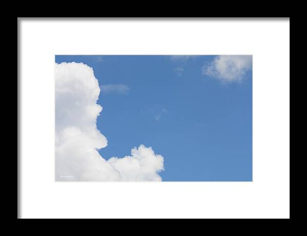Clouds Framed Print featuring the photograph The Man In The Clouds by Diane Lindon Coy