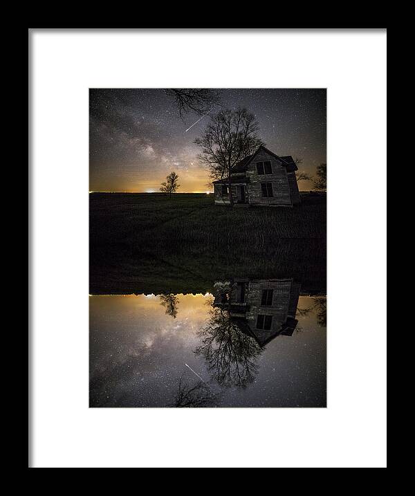 Sky Framed Print featuring the photograph Through a mirror darkly by Aaron J Groen