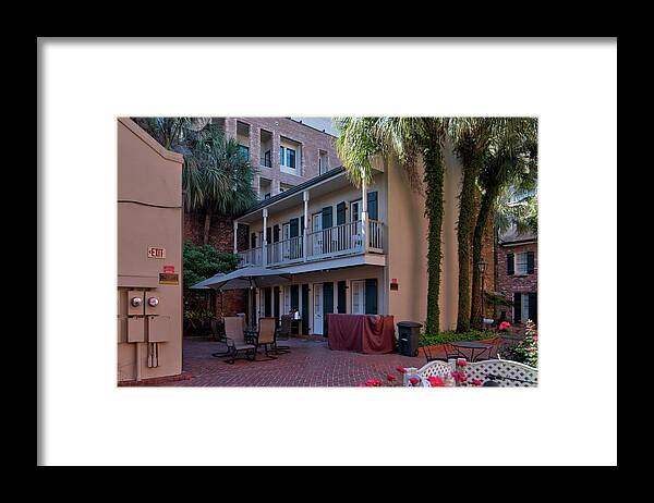 Timeshare Framed Print featuring the photograph Timeshare Courtyard by Jeff Kurtz
