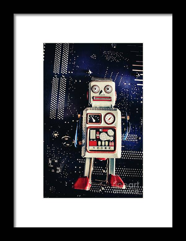 Robot Framed Print featuring the photograph Tin toy robots by Jorgo Photography