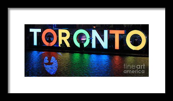 Toronto Framed Print featuring the photograph Toronto Sign with Umbrella Silhouette by Nina Silver