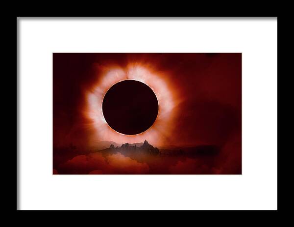 Clouds Framed Print featuring the photograph Total Eclipse of the Sun in the Mountains by Debra and Dave Vanderlaan