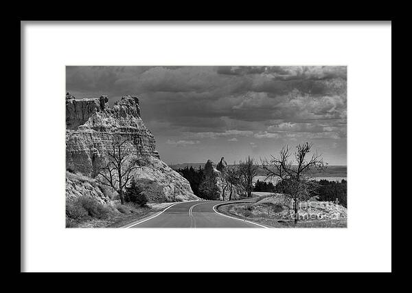 The Badlands Framed Print featuring the photograph Traveling The Badlands by Nadalyn Larsen