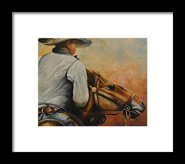 A Oil Painting Of A Cowboy Turning His Horse Around To Head Home. The Cowboy Has A Hat On With A Feather In The Hat Ban. He Is Wearing A Grey Vest With A Blue Shirt. He Is Also Wearing Blue Jeans With A Pair Of Leather Chaps. He Is Turning His Horse Around To Head Back To His Ranch. Framed Print featuring the painting Turning Around by Martin Schmidt