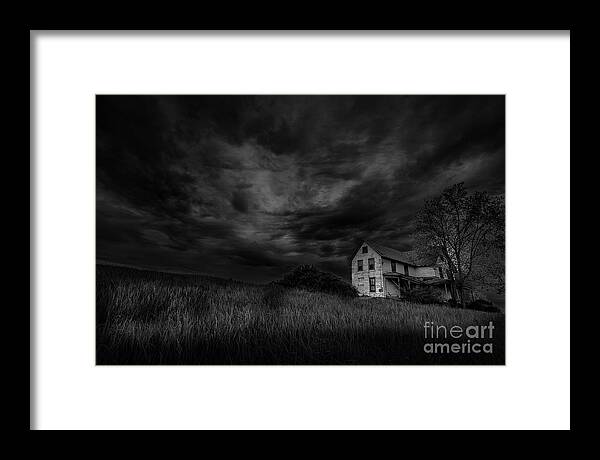 Abandoned Framed Print featuring the photograph Under Threatening Skies by Roger Monahan