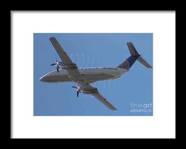 United Airlines Framed Print featuring the photograph United Metroliner by John Linder