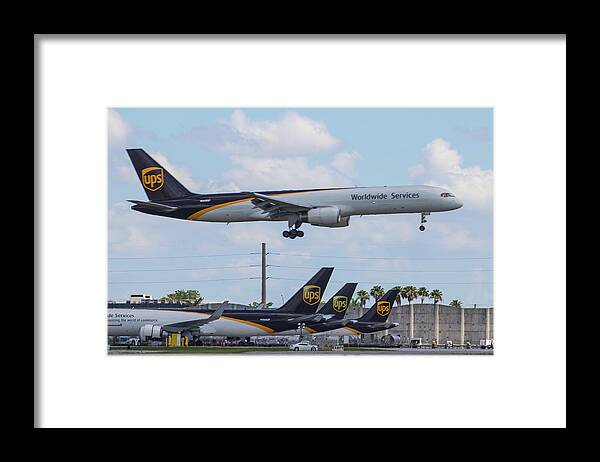 Ups Framed Print featuring the photograph UPS Over UPS by Dart Humeston