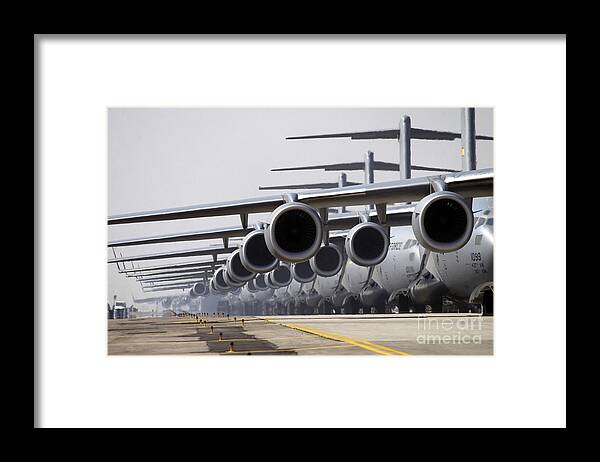 Color Image Framed Print featuring the photograph U.s. Air Force C-17 Globemaster IIis by Stocktrek Images