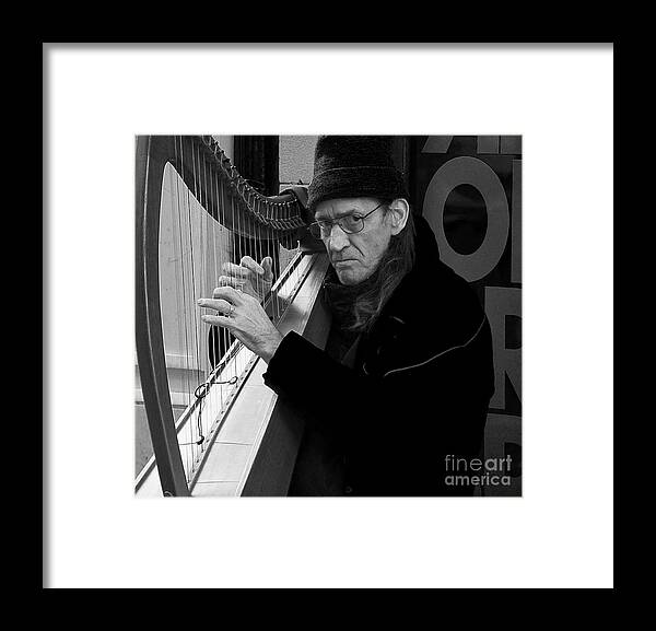Black And White Portrait Framed Print featuring the photograph Vagrant music by Elena Perelman