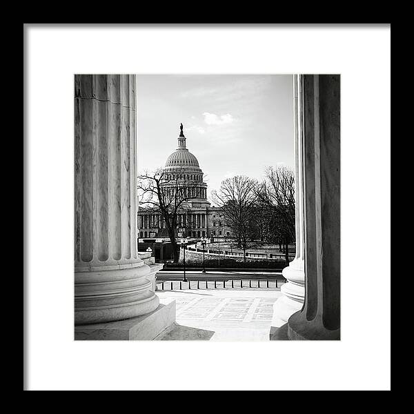 Statue Framed Print featuring the photograph View of Capitol Hill through the Supreme Court by Brandon Bourdages