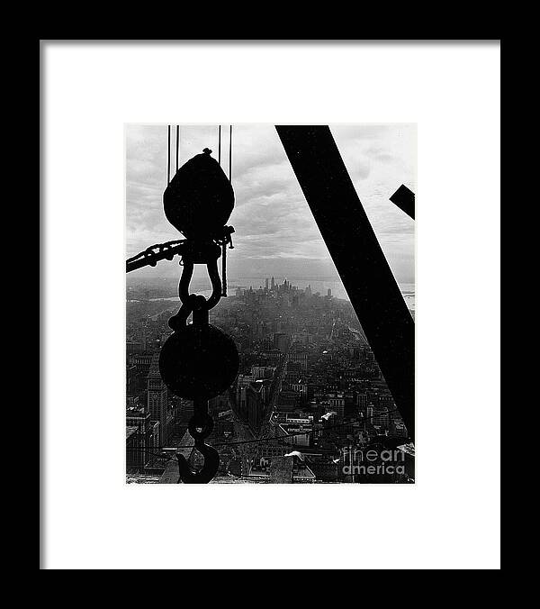 View; Lower Manhattan; Manhattan; Us; Usa; America; American; United States; New York; Urban; City; Cityscape; Architecture; 1930s; 30s; Thirties; Photography; Black And White Photograph; B/w Photo; Hook; Winch; Construction; Empire State Building; Landmark; History; Historical; Building; Dramatic; Scenic; Picturesque; Achievement Framed Print featuring the photograph View of Lower Manhattan from the Empire State Building by LW Hine