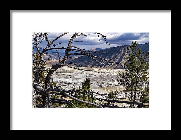 America Framed Print featuring the photograph View of the travertine and mountains from the pathway at Mammoth Hot Springs by Roslyn Wilkins