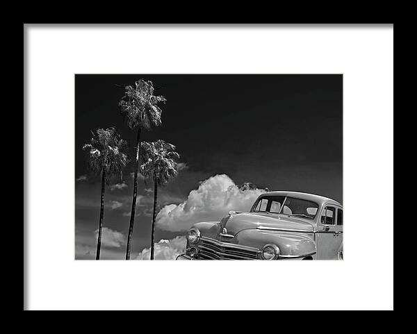 Car Framed Print featuring the photograph Vintage Plymouth Automobile in Black and White against Palm Trees by Randall Nyhof