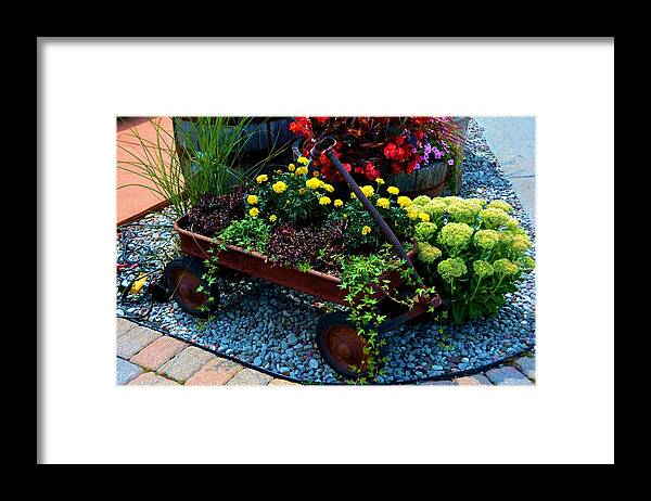 Vintage Framed Print featuring the photograph Vintage Toy Wagon and Flowers by Nancy Jenkins