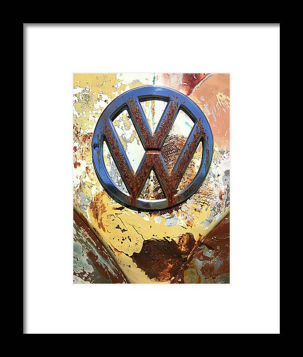 Kelly Hazel Framed Print featuring the photograph VW Volkswagen Emblem with Rust by Kelly Hazel