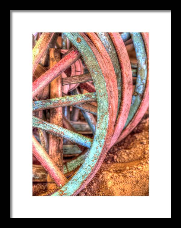 Horse Framed Print featuring the photograph Wagon Wheels by Jerry Sodorff