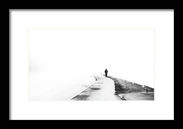 Man In Fog Framed Print featuring the photograph Walker and the Fog by John Williams