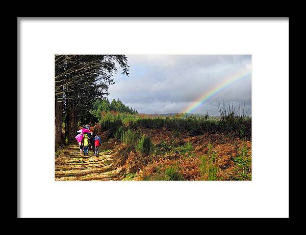 Limousin Framed Print featuring the photograph Walkers with rainbow by Rod Jones