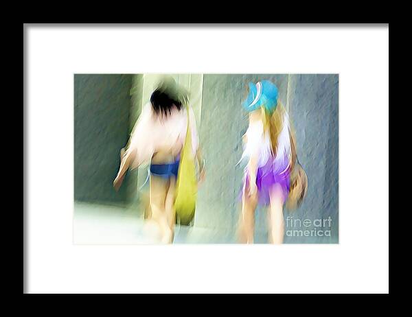 Motion Framed Print featuring the photograph Walking down the street by Tatiana Travelways