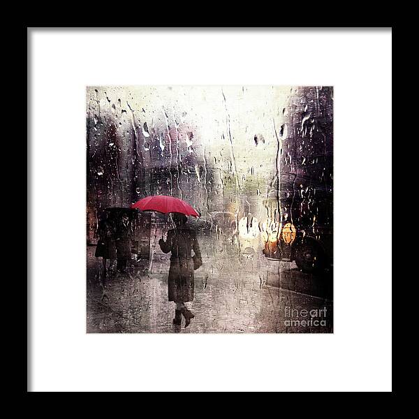 Walking In The Rain Somewhere Framed Print featuring the photograph Walking in the Rain Somewhere by Carlos Diaz