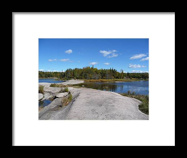 Rocks Framed Print featuring the photograph Walking on the whale's back by Ruth Kamenev