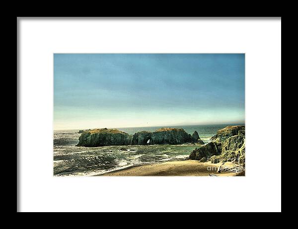 Ocean Framed Print featuring the photograph Watching the rocks and waves by Jeff Swan