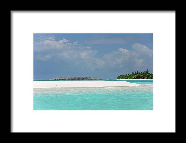 Jenny Rainbow Fine Art Photography Framed Print featuring the photograph Water Bungalows of Maldivian Resort by Jenny Rainbow