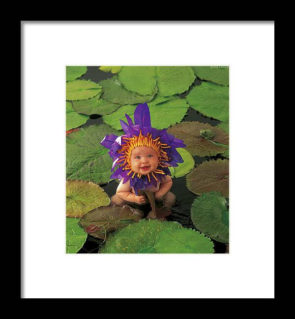 Flower Framed Print featuring the photograph Tayla as a Waterlily by Anne Geddes