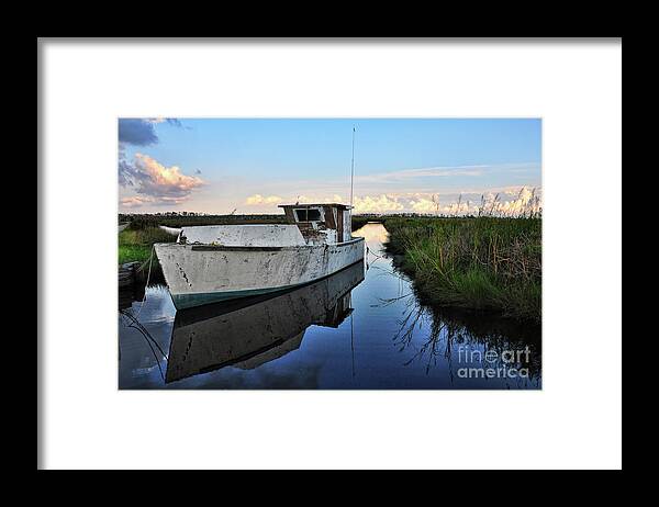 Boat Framed Print featuring the photograph Weathered Reflection by Randy Rogers