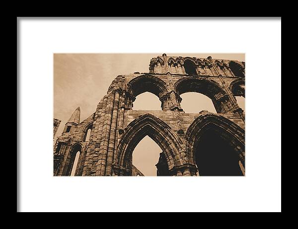 Whitby Abbey England Sepia Old Medieval Middle Ages Church Monastery Nun Nuns Architecture York Yorkshire Monasteries Ruins Saint Century Black Death Building  Cathedral Cloister Feudal Benedictine Monk Monks Celtic Bram Stoker Dracula Framed Print featuring the photograph Whitby Abbey #73 by Raymond Magnani
