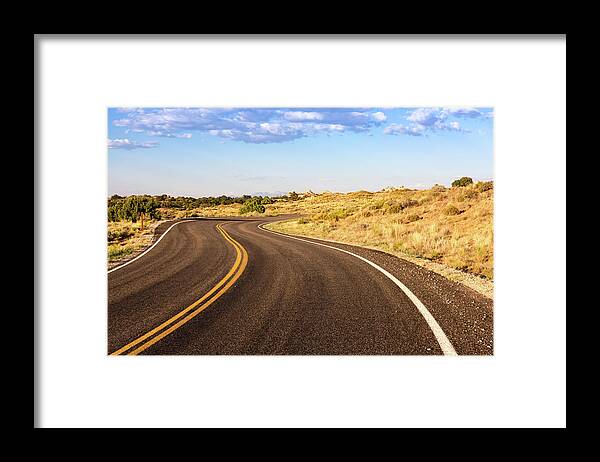 Nature Framed Print featuring the photograph Winding Desert Road at Sunset by Kyle Lee