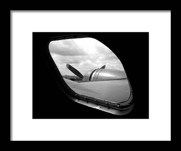 Airplane Framed Print featuring the photograph Wing And Window by Dan Holm