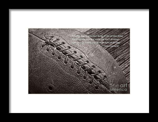 Football Framed Print featuring the photograph Winning Quote from Vince Lombardi by Edward Fielding
