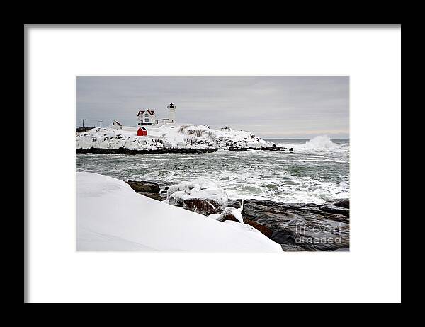 Nubble Lighthouse Framed Print featuring the photograph Winter at the Nubble by Steve Brown