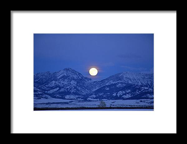 Moon Framed Print featuring the photograph Winter Full Moon Over the Rockies by Bruce Gourley