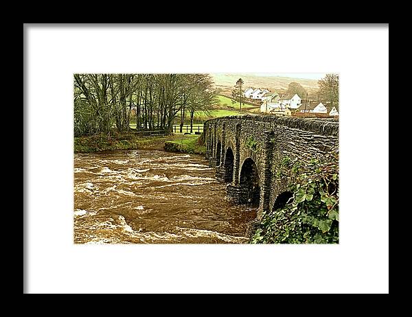 Rivers Framed Print featuring the photograph Withypool Bridge in Flood by Richard Denyer