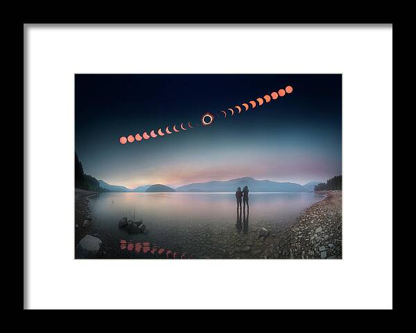 2017 Framed Print featuring the photograph Woman and girl standing in lake watching solar eclipse by William Lee