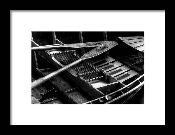 Wooden Rowboat Framed Print featuring the photograph Wooden Rowboat And Oars In Black And White by Carol Montoya