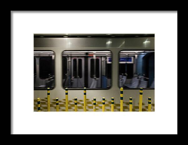 Metro Framed Print featuring the photograph Yellow Poles by Ginger Stein