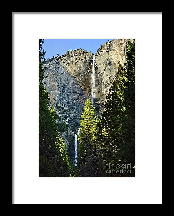 Yosemite Falls Framed Print featuring the photograph Yosemite Falls with late afternoon light in Yosemite National Park. by Jamie Pham
