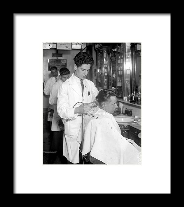 Working Framed Print featuring the photograph Barbers Shop #1 by Fox Photos