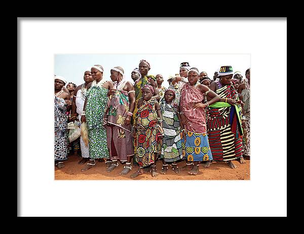 People Framed Print featuring the photograph Benins Mysterious Voodoo Religion Is #1 by Dan Kitwood