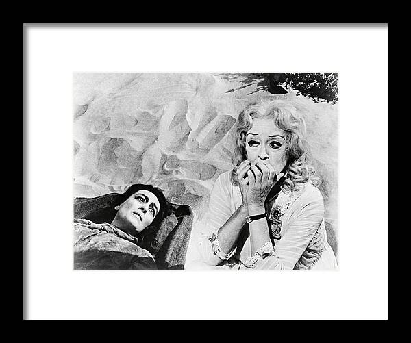Bette Davis Framed Print featuring the photograph BETTE DAVIS and JOAN CRAWFORD in WHAT EVER HAPPENED TO BABY JANE? -1962-. #1 by Album