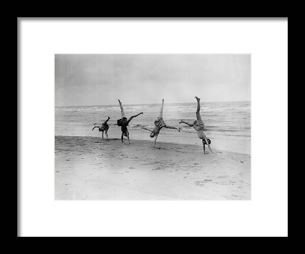 Belgium Framed Print featuring the photograph Cartwheels #1 by Fox Photos