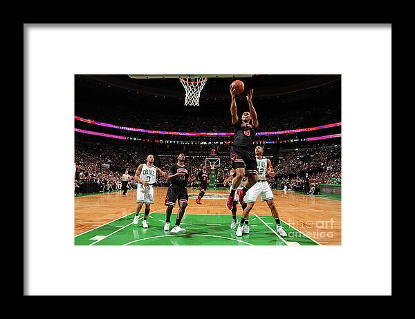 Cristiano Felicio Framed Print featuring the photograph Chicago Bulls V Boston Celtics - Game #1 by Brian Babineau