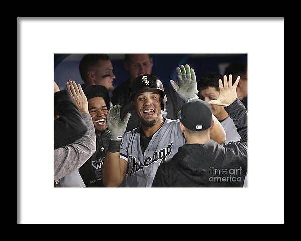 People Framed Print featuring the photograph Chicago White Sox V Toronto Blue Jays by Tom Szczerbowski
