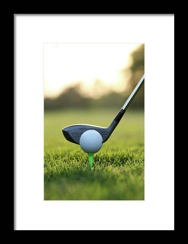 Grass Framed Print featuring the photograph Close Up Of Golf Ball And Club On Course #1 by Visage