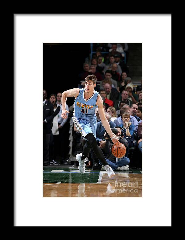 Nba Pro Basketball Framed Print featuring the photograph Denver Nuggets V Milwaukee Bucks by Gary Dineen