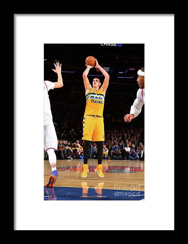 Nikola Jokic Framed Print featuring the photograph Denver Nuggets V New York Knicks #1 by Jesse D. Garrabrant