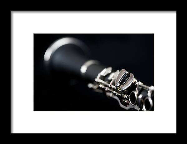 Clarinet Framed Print featuring the photograph Detail Of A Clarinet #1 by Junior Gonzalez